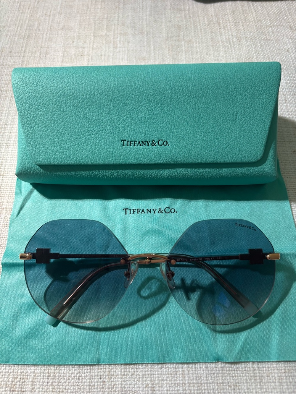 Tiffany & Co. Teal Gradient Rimless Sunglasses with Gold Accents